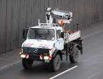 MB UNIMOG mit Hydraulikgreifarm als Aufsatz, 13.01.11 Berliner Stadtautobahn H�he Knobelsdorffstr.