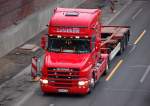 Eine SCANIA Hauber T500 Zugmaschine der Fa.Klaus Leistikow mit unbeladenem Containertr�gerauflieger, 21.01.11 Berliner Stadtautobahn H�he Spandauer Damm Br�cke.