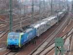 MRCE Mietlok ES64F4-152/EU45-152 (91 80 6189 152-2 D-DISPO, Siemens Bj.2009) der PKP-Cargo mit Leerzug PKW-Transportwageneinheiten (BLG-LOGISTICS) Richtung Nordosten am 28.02.13 Berlin-Putlitzbr�cke.
