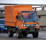 multicar champion mit Pritschenplanenabdeckung, 18.03.09 Berliner Stadtautobahn H�he Spandauer Damm Br�cke.