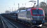 Und weil sie so neu und schön ist nochmal die neue PKP Cargo Vectron EU46-502 und nochmal mit Transportzug mit fabrikneuen Fiat aus polnischer Produktion am 17.02.16 Berlin-Hirschgarten.