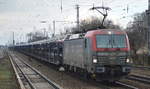 PKP Cargo mit EU46-506/193-506 und PKW-Transportzug am 20.01.18 Berlin-Hirschgarten.
