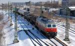 East-West Railways 232 128-9 mit einem Kurzzzug unterschiedlicher Kesselwagen, 13.03.13 Berlin-Putlitzbr�cke.