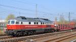 Easr-West Railways Lok 232 303-8 mit einem gemischten Güterzug am 03.04.14 Berlin-Springpfuhl.