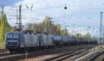 RBH Doppeltraktion 104/143 191-5 + 127/143 040-4 mit Kesselwagenzug am 23.04.147 Berlin-Springpfuhl.