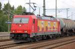 Hier noch mal aus der N�he, HGK 2054/185 586-5 (91 80 6185 586-5 D-HGK) mit Kesselwagenzug, 12.08.11 Bhf.