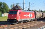 HGK 2052/185 584-0 (91 80 6185 584-0 D-HGK) mit Kesselwagenzug Richtung Bernau, 24.07.12 Berlin-Blankenburg.