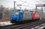 HGK Doppeltraktion mit ATC Mietlok 185 521-2 + 2056/185 588-1 am 25.02.13 Richtung Berlin-Blankenburg, 25.02.13 Berlin-Pankow.