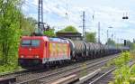 HGK/RHC 185 586-5 mit Kesselwagenzug am 04.05.15 Berlin-Karow.