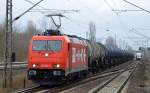RHC 185 587-3 mit Kesselwagenzug (leer) Richtung Stendell am 15.03.16 Berlin-Hohenschönhausen.
