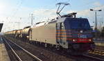 HSL mit 185 594-9 mit Kesselwagenzug (geschmolzenes Schwefel) am 13.02.18 Bf. Flughafen Berlin-Schönefeld.