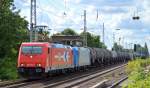 Doppeltraktion RHC 2067/185 632-7 + 185 523-8 mit Kesselwagenzug Richtung Schwedt am 27.08.14 Berlin-Karow.