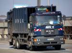 AWU ein Unternehmen der ALBA Group in den selben Farben mit einem MAN M�llentsorgungsfahrzeug mit HALLER M�llpresse, 01.04.09 Berliner Stadtautobahn H�he Spandauer Damm.