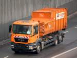 MAN TGX Abrollkipper der BSR am 05.02.10 Berliner Stadtautobahn H�he Kaiserdamm.