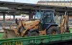 Ein CASE 590 Super LE 4x4 Baggerlader auf einen Unterflurwagen der Fa.