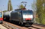 MRCE Dispolok ES 64 F4-284 (91 80 6189 284-3 D-DISPO) der CTL mit Kesselwagenzug, 20.04.11 Berlin-Karow.