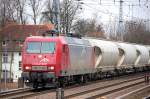 EKO-Trans 145-CL 002 (91 80 6145 082-4 D-EKO) mit einem typischen Ganzzug Gro�silowagen f�r Braunkohlestaub Richtung Bernau, 31.03.11 Berlin-Karow.