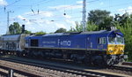 HHPI 29001 (266 461-3) mit einem typischen Schüttgutförderzug hatte einige Zeit am Rand des Gbf.