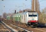 ITL 285 104-6 mit Sch�ttgutwagen (Typ Fcs) der eigenen Firma in gr�ner Farbe Richtung Karower Kreuz Berlin, 29.03.11 