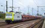 ITL/Captrain 145 094-9 mit PKW-Transportzug mit fabrikneuen VW Caddy + einigen VW Transportern am 11.09.14 Bhf.