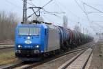 ATC Mietlok 185 522-0 von ITL mit Kesselwagenzug Richtung Schwedt am 21.01.15 Berlin-Hohenschönhausen.