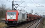 ITL 185 650-9 mit einem PKW-Transportzug (VW-Nutzfahrzeuge) am 17.12.15 Berlin-Hohenschönhausen.