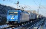 ITL 185 524-6 mit Containerzug am 19.01.16 Berlin-Hohenschönhausen.