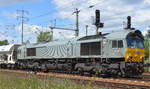ITL mit ihrer CB 1001 (266 106-4) und SChüttgutwagenzug am 04.07.17 Bf.