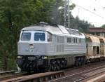 ITL W 232.03 (V400, Bj.1977, Umbau ADtranz 1999) mit einem Ganzzug polnischer Spezialsch�ttgutwagen Richtung Bernau, 15.07.09 Berlin-Karow.