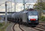MRCE Dispo ITL ES 64 F4-212 (91 80 61879 212-4 D-DISPO) mit einem Ganzzug Kesselwagen bei der Durchfahrt im Bhf.