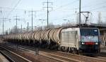 MRCE Dispolok ES 64 F4-008 f�r LEG t�tig mit Kesselwagenzug und am Ende des Zuges die LEG Dieselloks 202 484-2 + 202 327-3 am 04.01.14 Durchfahrt Flughafen Berlin-Sch�nefeld.