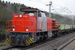 LOCON 275 809-2 mit einem Ganzzug flacher Schüttgutkippwagen vom Typ Fakks der Fa.