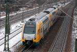 ODEG RE4 nach Ludwigsfelde mit ET 445.109 Richtung Berlin Hbf.(tief), 17.01.13 Berlin-Beusselbr�cke.