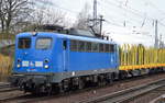 PRESS 140 037-1 (140 831-9) mit Stammholz-Transportzug (leer) am 16.03.17 Berlin-Hirschgarten.
