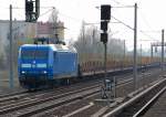 PRESS 145 030-7 (91 80 615 085-7 D-PRESS, Bj.2000) mit Leerzug Drehgestellflachwagen f�r Holztransporte Richtung Berlin-Blankenburg, 08.04.09 Berlin-Pankow.
