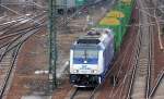 IGT Mietlok 246 011-1 (92 80 1246 011-1 D-IGT, Bombardier Bj.2006) angemietet von Raildox mit Leerzug Rungenwagen f�r Holztransporte Richtung Nordosten, 13.02.13 Berlin-Putlitzbr�cke.
