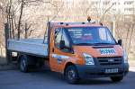 Ein FORD TRANSIT mit Ladefl�che der Dienstleistungsfirma RUWE aus Nerlin, 26.03.12 Berlin-Pankow.
