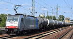 LINEAS NV/SA, Bruxelles [B] mit der geleasten Railpool Lok  186 494  [NVR-Nummer: 91 80 6186 494-1 D-Rpool] und einem Kesselwagenzug am 11.06.25 Höhe Bahnhof Schönefeld b.