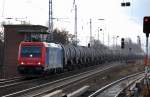 Re 482 037-9 im Moment f�r Infra Leuna t�tig mit Kesselwagenzug Richtung Bernau, 21.12.11 Berlin-Karow.