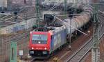 SBB Cargo Mietlok Re 482 044-5 mit Kesselwagenzug Richtung Spandau am 08.01.14 Berlin-Putlitzbrücke.