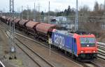 Re 482 035-3  f�r Raildox t�tig f�r die DB mit gedeckten Sch�ttgutwagen der DB am 15.03.16 Berlin-Springpfuhl Richtung Nordosten.