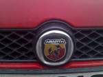 Hier noch mal als Frontlogo, das Herstellerlogo von Abarth aus Italien auf einem Abarth Grande Punto, 22.02.13 Berlin-Pankow.