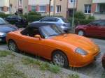 FIAT Barchetta in orange, 09.08.12 Berlin-Pankow.