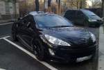 Peugeot 308 CC in schwarz, 31.01.13 Berlin-Wei�ensee.