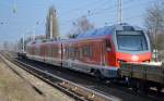 Fabrikneuer vierteiliger FLIRT (94 80 1428 011-9 D-DB) für die DB Regio AG Region NRW Münster vom Stadler Werk Berlin Pankow bei seiner Überführung am 17.02.15 Berlin-Karow
